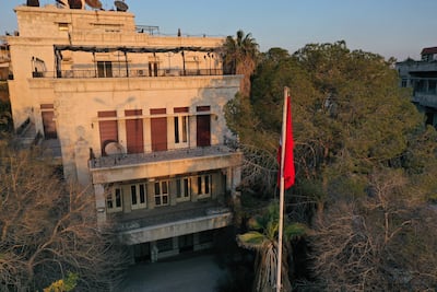 The Turkish flag is raised at Turkey's embassy in Damascus in December 2024 following the overthrow of Bashar Al Assad. Anadolu via AFP