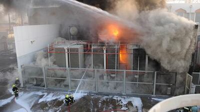 Fire crews putting out the fire that broke out at a power supply station in Musaffah, Abu Dhabi. Courtesy Security Media