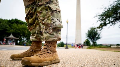 A member of the Mississippi National Guard stands near the Washington Monument on the National Mall in August. Reuters