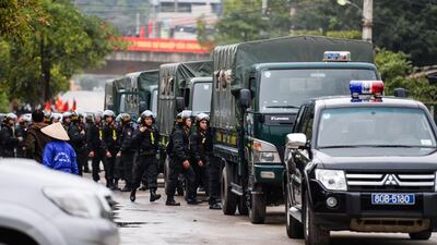 Vietnamese police arrive at the Dong Dang railway station. AFP