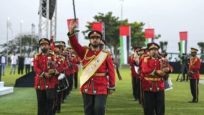 A marching band performs.
