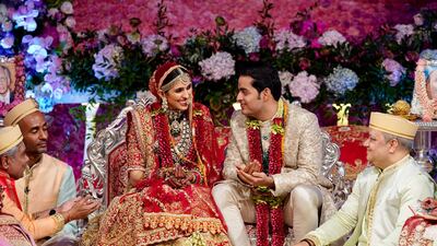 Akash Ambani and Shloka Mehta perform a ritual during their wedding ceremony on March 9, 2019. Reuters
