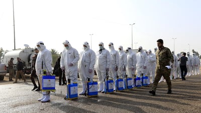 Members of the medical team during precautionary measures against the novel coronavirus outbreak in the holy city of Karbala, southern Baghdad. EPA