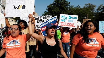 Demonstrators block roads near the White House to protest President Donald Trump's plan to repeal DACA in Washington