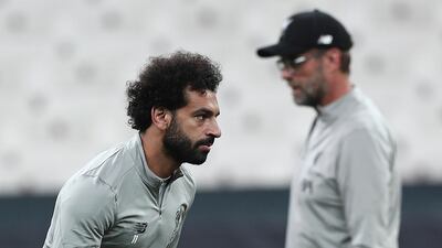 Salah and Liverpool's head coach Juergen Klopp during a training session. EPA