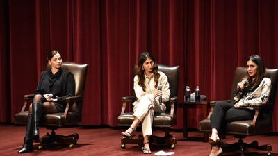 Ms Bayat, right, speaks at the Unsilenced: A Call to Action event in Los Angeles. Photo: Dan Druhora