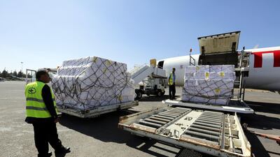 Workers unload emergency medical aid supplied by Unicef at Sanaa International Airport, Yemen on November 25, 2017 after it was reopened to UN humanitarian flights. Yahya Arhab / EPA