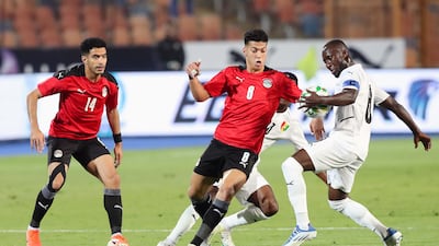 Guinea midfielder Naby Keita challenges Egypt's Emam Ashour during the Afcon match in Cairo. EPA