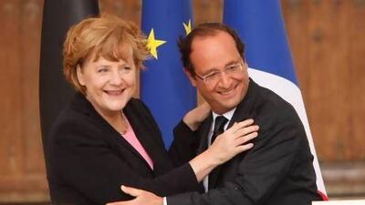 German chancellor Angela Merkel and French president Francois Hollande attend a ceremony to celebrate 50 years of French and German reconciliation in Reims, France.