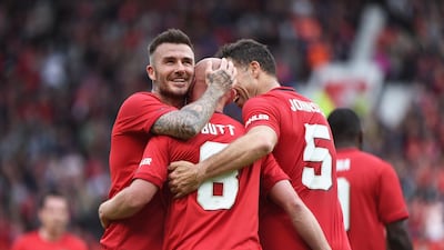 Nicky Butt of Manchester United celebrates with Beckham after scoring. Getty