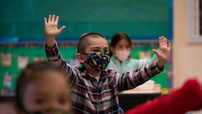 Kindergarten students participate in a classroom activity on the first day of in-person learning at Maurice Sendak Elementary School in Los Angeles earlier this month. AP Photo