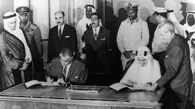 President of the United Arab Republic Gamal Abdel-Nasser and Saudi King Faysal, sign an agreement on a peace plan to end the three year civil war in the Yemen in King Faysal palace in Jeddah 24 August 1965. Photo: AFP