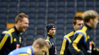 The spotlight will be on Zlatan Ibrahimovic, centre, as Sweden tries to make up a one-goal deficit and pip Portugal for a place at the 2014 World Cup. Jonathan Nackstrand / AFP