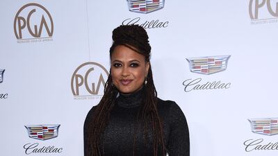 Director and producer Ava DuVernay won the Visionary Award on the night, and this classic black midi length is definitely her dress. Chris Delmas / AFP