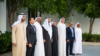 Sheikh Mohamed with a delegation representing banks and financial institutions, including Mr Al Ghurair. Hamad Al Kaabi / UAE Presidential Court