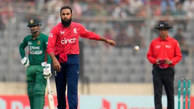 England's Adil Rashid celebrates the dismissal of Bangladesh batter Rony Talukdar for 24. AP