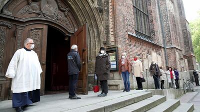 People arrive at Frauenkirche 'Cathedral of Our Lady' for evening mass on the first day churches and other houses of worship are allowed to hold services again in Bavaria, Germany. Getty