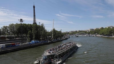 Pollution levels in the River Seine in Paris led to the cancellation of the men's triathlon on Tuesday. AFP
