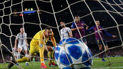 Rafinha scores to give Barcelona the lead against Inter Milan. Reuters