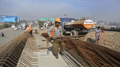 India’s plan to develop inter-city passages should improve investment opportunities in the country, it said. Channi Anand / AP Photo