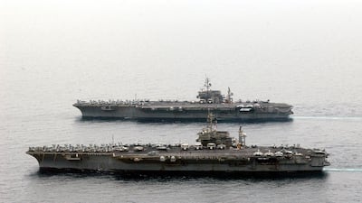 This photo released by the US Navy in April 2003 shows the aircraft carriers USS Kitty Hawk (front) and USS Constellation in the Gulf. AFP