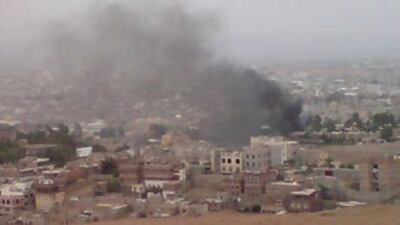 Smoke rises from the area around the US embassy in Sana'a on Sept 17 2008 after a car bomb set off a series of explosions, killing 16.