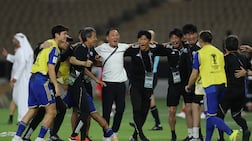 Machida Zelvia coach Go Kuroda, centre (white shirt), celebrates with players and staff members after the AFC Champions League semi-final win over Shabab Al Ahli. Getty Images