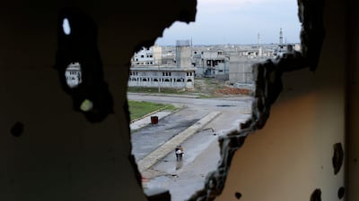 The Syrian Negotiation Commission arrived in London on Tuesday aiming to find a route to resolving the situation in the country. Hassan Ammar / AP