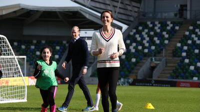 Underneath the Barbour jacket is a white Ralph Lauren cricket jumper. Getty Images
