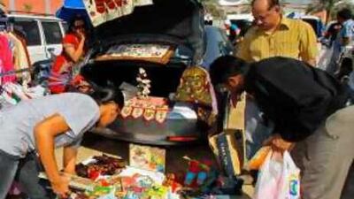 Shoppers browse the wares on display at the car boot sale last weekend at International City in Dubai.