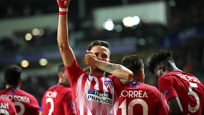 Saul Niguez of Atletico celebrates after scoring his sides third goal. Getty