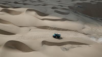 Petronas' driver Gerard de Rooy and co-driver Darek Rodewald in action. Reuters