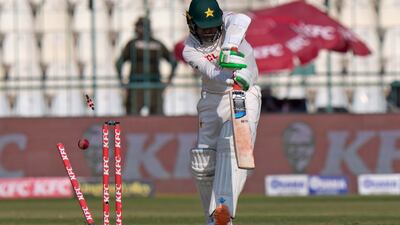 Pakistan batter Zahid Mahmood is bowled by England's Mark Wood during Day 4 in Multan. AP