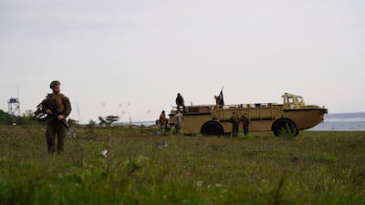 US troops on Gotland beach in Sweden following amphibious landing drill as part of annual Nato military exercises. AP