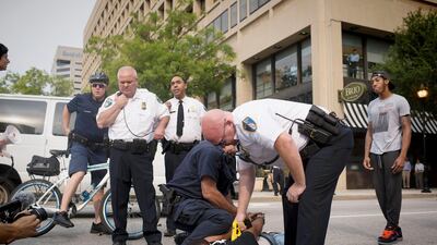 Activist Kwame Rose, who features in ‘Baltimore Rising’, is arrested during protests in the city. Getty