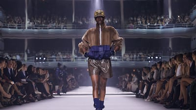 Bomber jackets and a reimagined version of Fendi's classic Baguette bag appeared on the runway. AFP