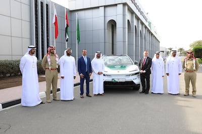 The Lotus was presented to Brig Khalfan Al Jallaf, director of Dubai Tourist Police. Photo: Dubai Media Office