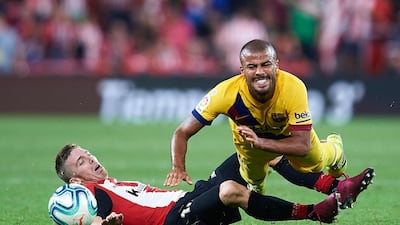 Here, Iker Muniain of Athletic Bilbao competes for the ball with Barcelona's Rafinha in a very physical match. Getty Images