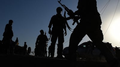 File photo: Afghan military personnel walk near the airport during fighting between Taliban militants and Afghan security forces in Kunduz on October 1, 2015. AFP