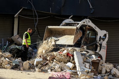 Heavy machinery removes the rubble after an Israeli strike on the southern suburbs of Beirut. Reuters