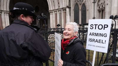About 100 people outside the court began cheering and chanting 'Free Palestine' after the ruling was announced. PA