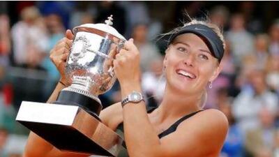 Maria Sharapova, who completed a career grand slam by winning the French Open women's singles title on Saturday, has regained the world No 1 ranking. Michel Euler / AP Photo