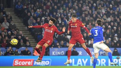Roberto Firmino scores Liverpool's first goal against Leicester City at The King Power Stadium. Getty Images