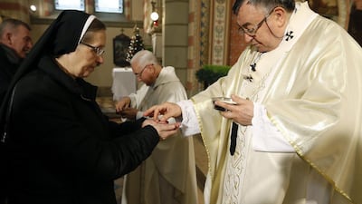 Bosnian Cardinal Vinko Puljic (R) leads the Christmas Day service at the Cathedral of the Heart of Jesus in Sarajevo, Bosnia and Herzegovina. EPA/FEHIM DEMIR