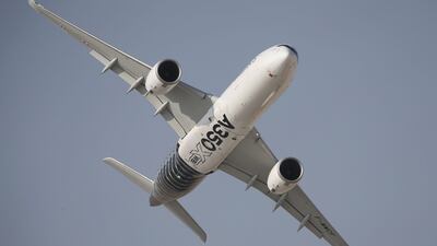 An Airbus A350 XWB performs during the opening of the Dubai Airshow. Airbus beat its own target for orders for last year, pushing it ahead of Boeing. Kamran Jebreili / AP