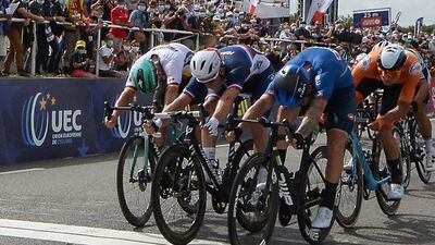 Italian rider Giacomo Nizzolo, right, crosses the finish line to win ahead of France's Arnaud Demare, centre, and Pascal Ackermann of Germany to win the elite men's road race at the European Championships in Plouay, western France, on Wednesday, August 26. AFP