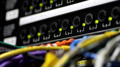 Network cables plugged into a computer server. Microsoft email services are back after an outage. Thomas White/Reuters