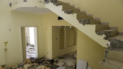 Derelict buildings in the Garden View Villas complex in Dubai keep neighbours awake at night doors banging in the wind. Christopher Pike / The National