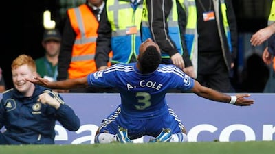Chelsea's Ashley Cole celebrates his goal against Stoke City during their English Premier League soccer match at Stamford Bridge, London, Saturday, Sept. 22, 2012. (AP Photo/Sang Tan)