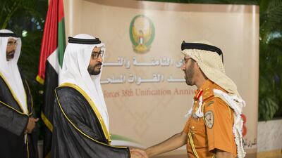 Sheikh Hamdan bin Zayed, Deputy Prime Minister and Ruler of the Western Region, left, greets high ranking Armed Forces personnel. Ryan Carter /Crown Prince Court - Abu Dhabi